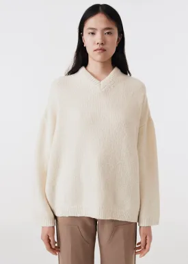 Asymmetric v-neck merino sweater off white