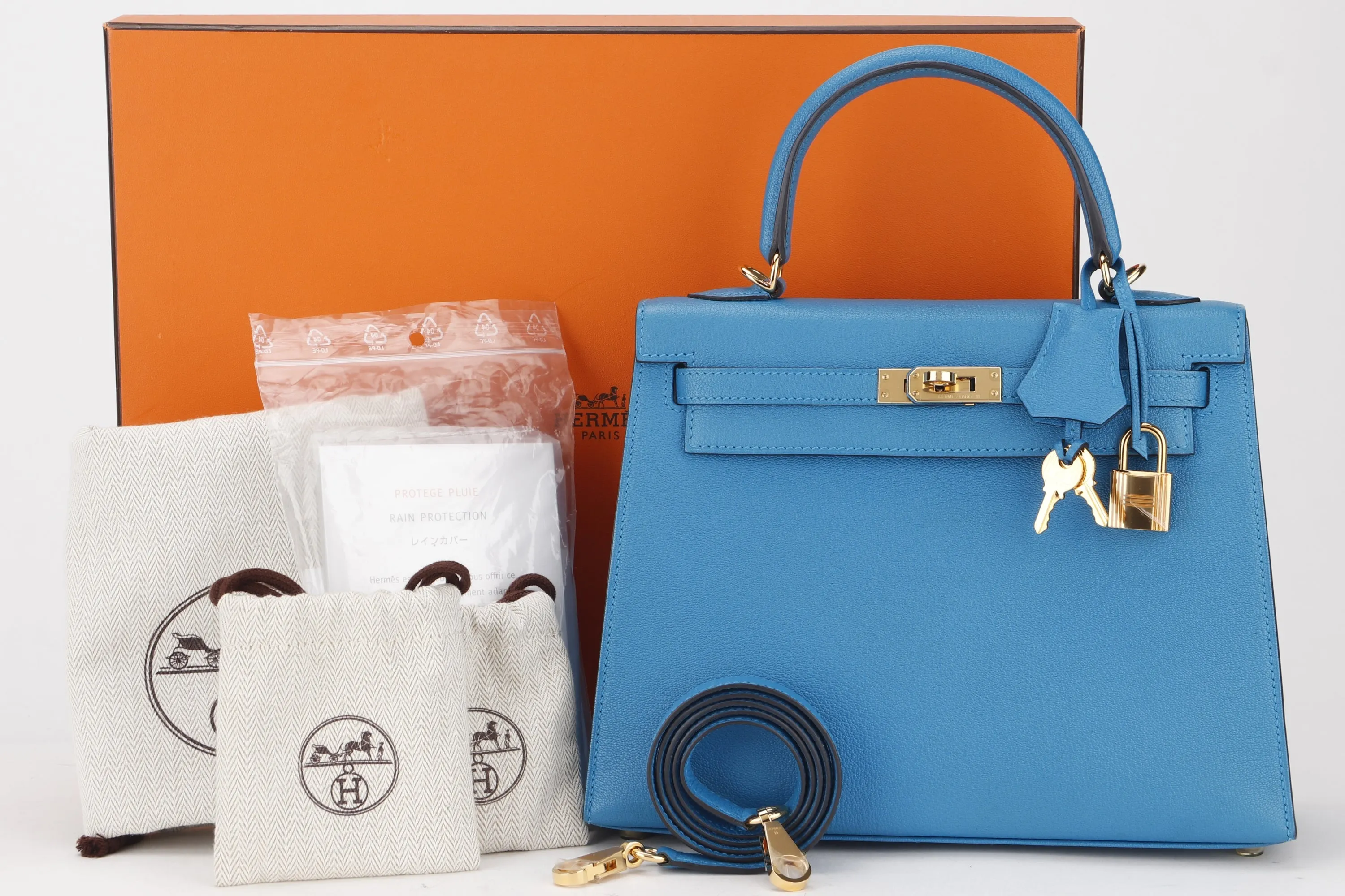 HERMES KELLY 25CM (STAMP C) BLUE ZANZIBAR CHEVRE LEATHER GOLD HARDWARE, WITH KEYS, LOCK, STRAP, RAINCOAT, DUST COVER & BOX